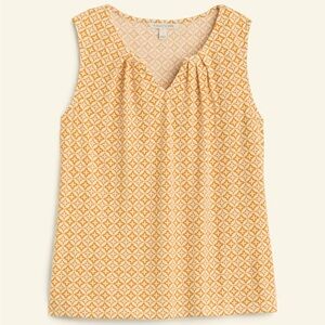 Lightweight sleeveless blouse.   Wear layered or alone!